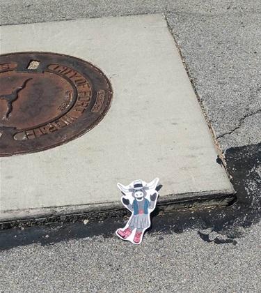 Molly showing seal around manhole drainage