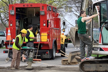 Youths working road construction