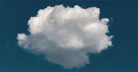 solo white cloud in a dark blue sky
