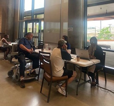 Participants meeting with financial advisors
