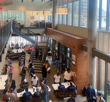 Participants from housing and income fair receiving resources