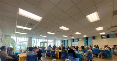 Housing and income fair participants register for services