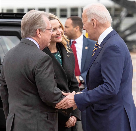 President Biden shakes hands with Mayor Parker and Judge Whitley