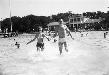 Swimmers running in Forest Park pool