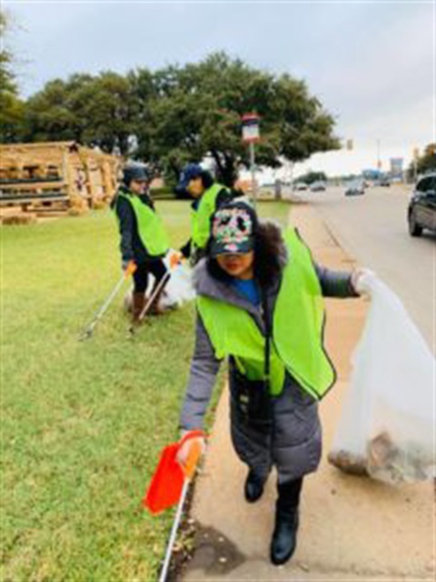 volunteers picking up trash