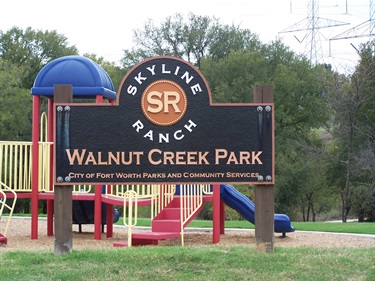 Park sign and playground