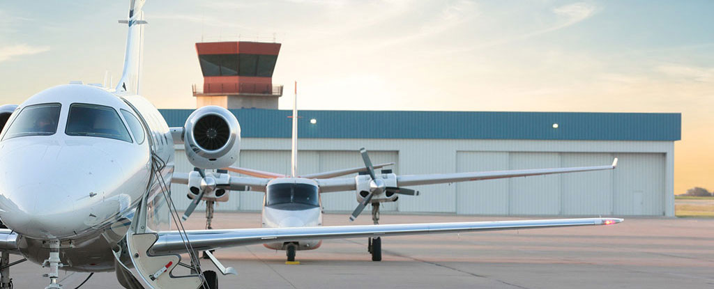 Hangar, plane and tower at Spinks Airport