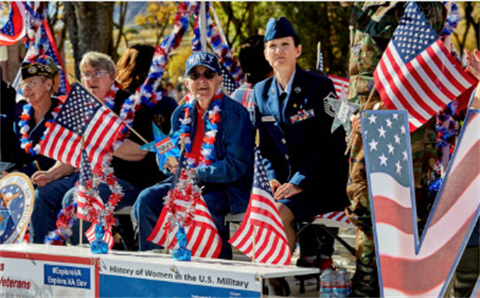 parade of female veterans on float
