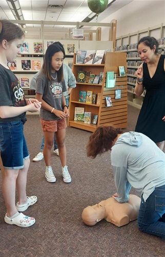 babysitting workshop participants learn CPR
