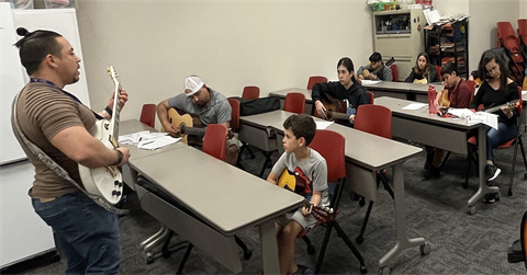 Learn how to play the guitar at the Library!