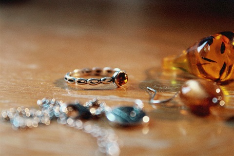 A pile of different pieces of jewelry on a table