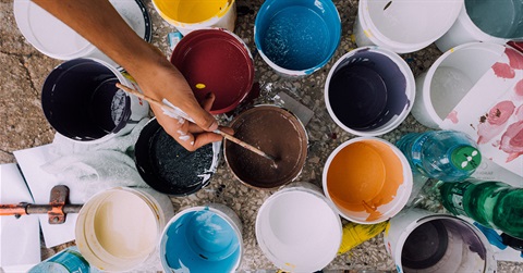 paint buckets with different color paints