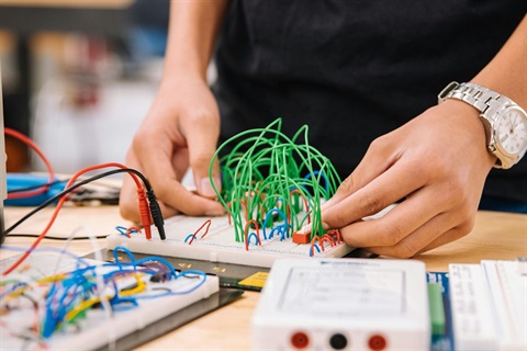 hang working with technology or experimenting with electric tech.jpg