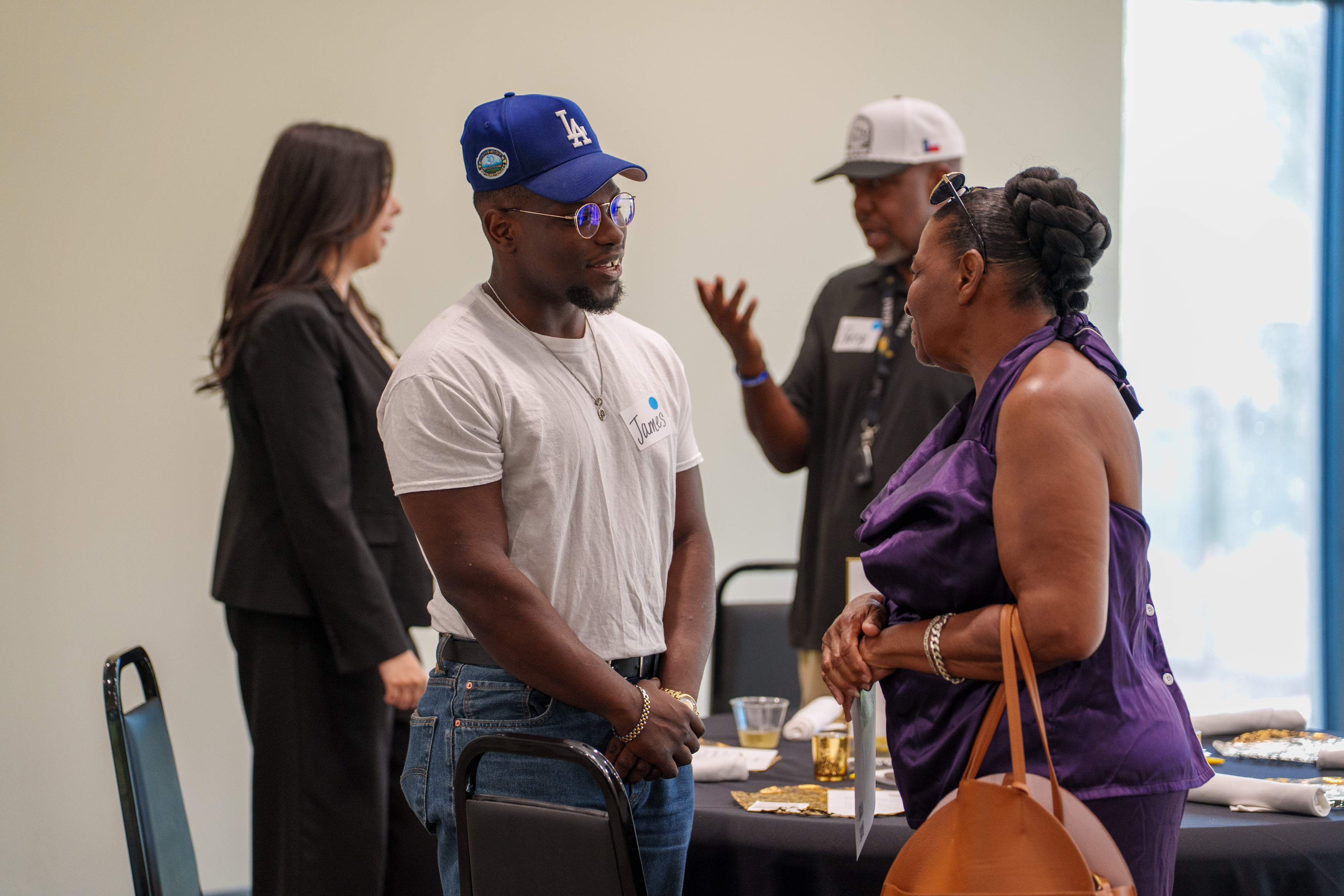 Two people chatting at the National Night Out event