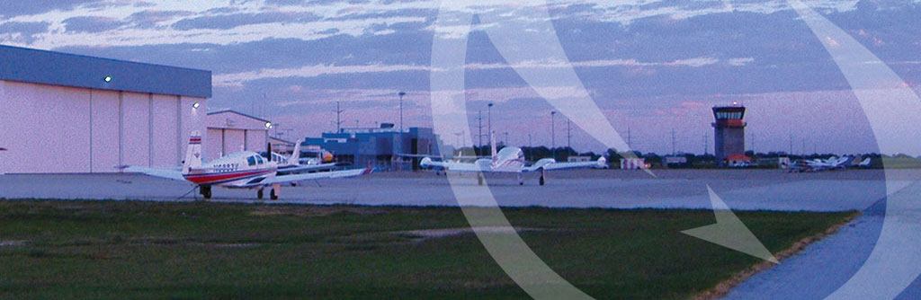 Spinks homepage banner two planes parked with log embossed