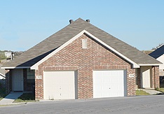 Duplex housing with two garages