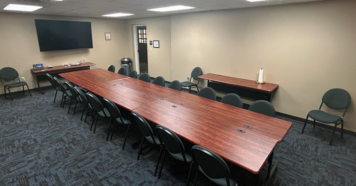Back corner view of the small conference room