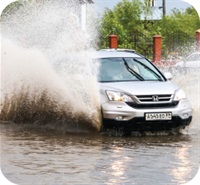 button of vehicle in high water