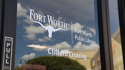 A picture of one of the front doors of the Clifford Library, a branch of the Fort Worth Public Library