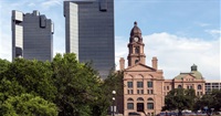 Tarrant County Courthouse with the skyline in the background