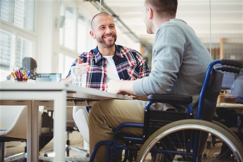 Accessibility & Accommodations image showing access to table with wheelchair